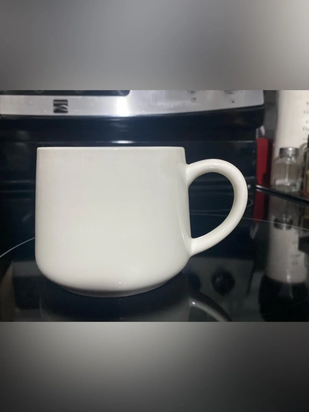 Peek-a-boo ceramic cow mug